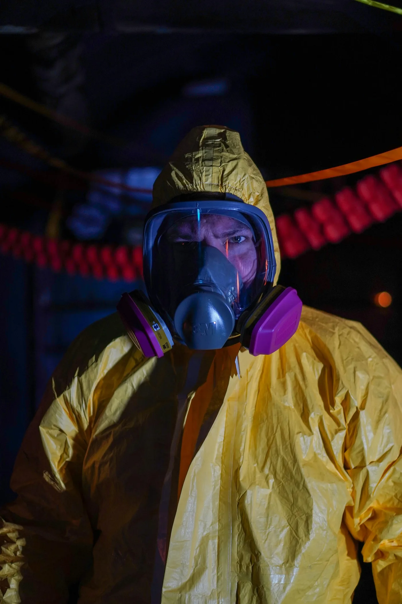 sewage cleanup Raleigh North Carolina — biohazard technician in full PPE performing sewage backup remediation